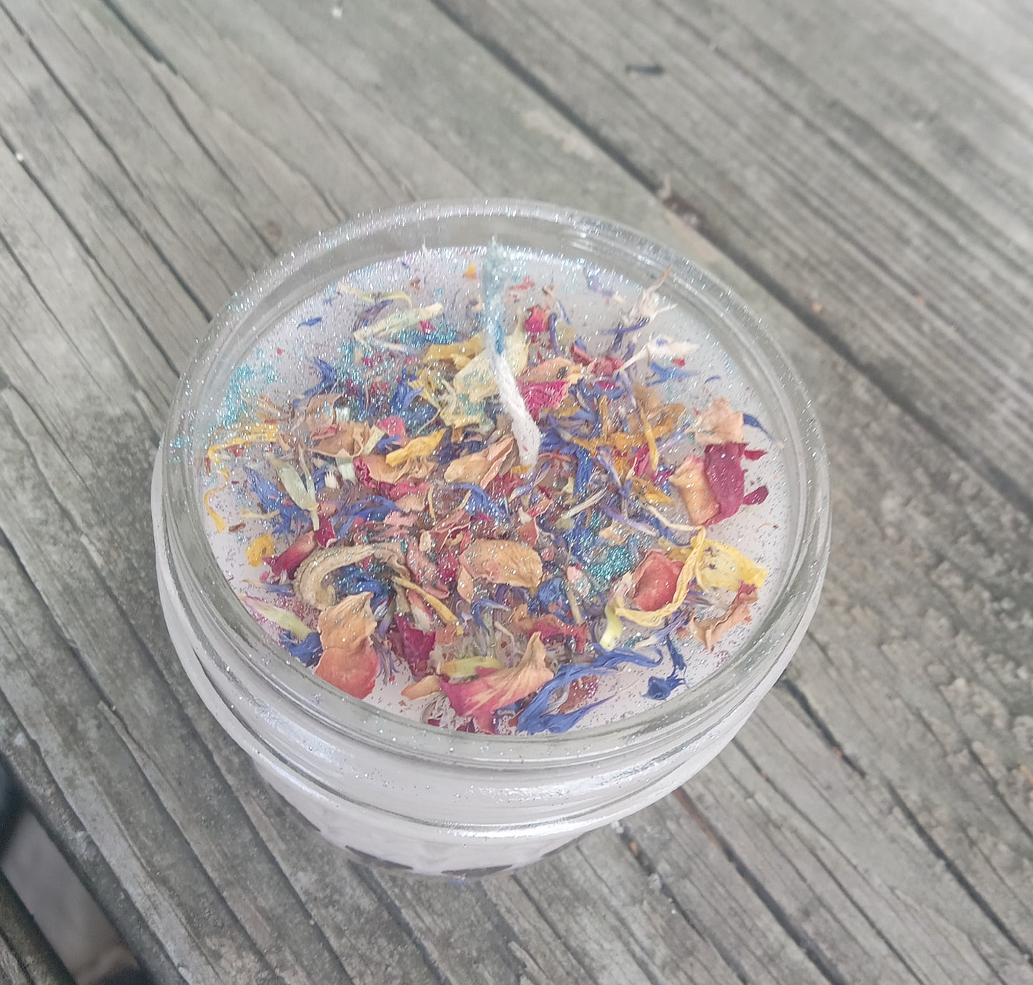 White Small Jar Candle with twine bow, dried herbs, and glitter